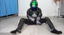 Girl masturbating in a leather bike suit